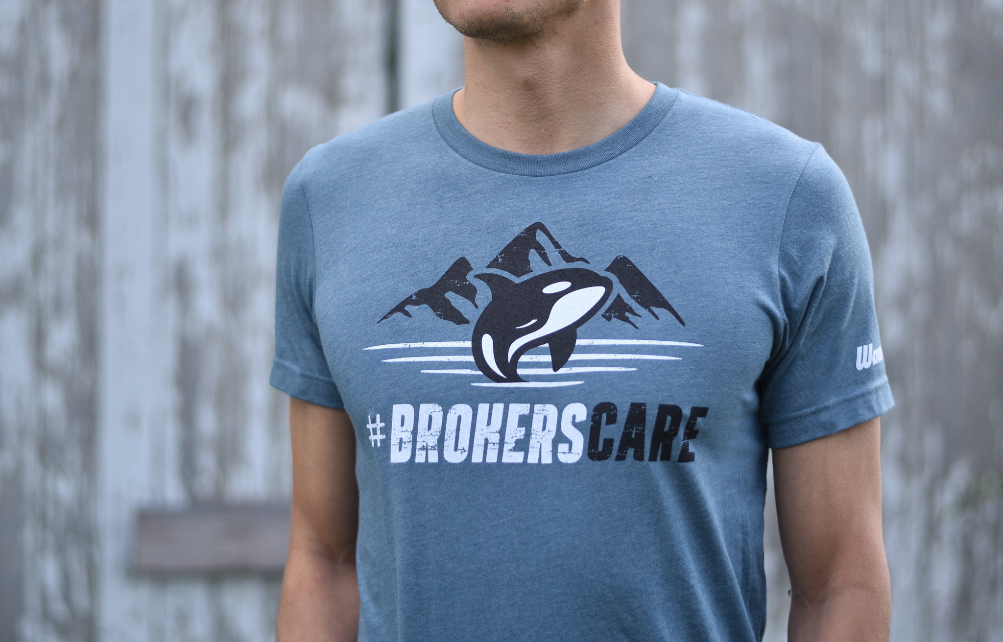 T-shirt promotional banner for #BrokersCare initiative